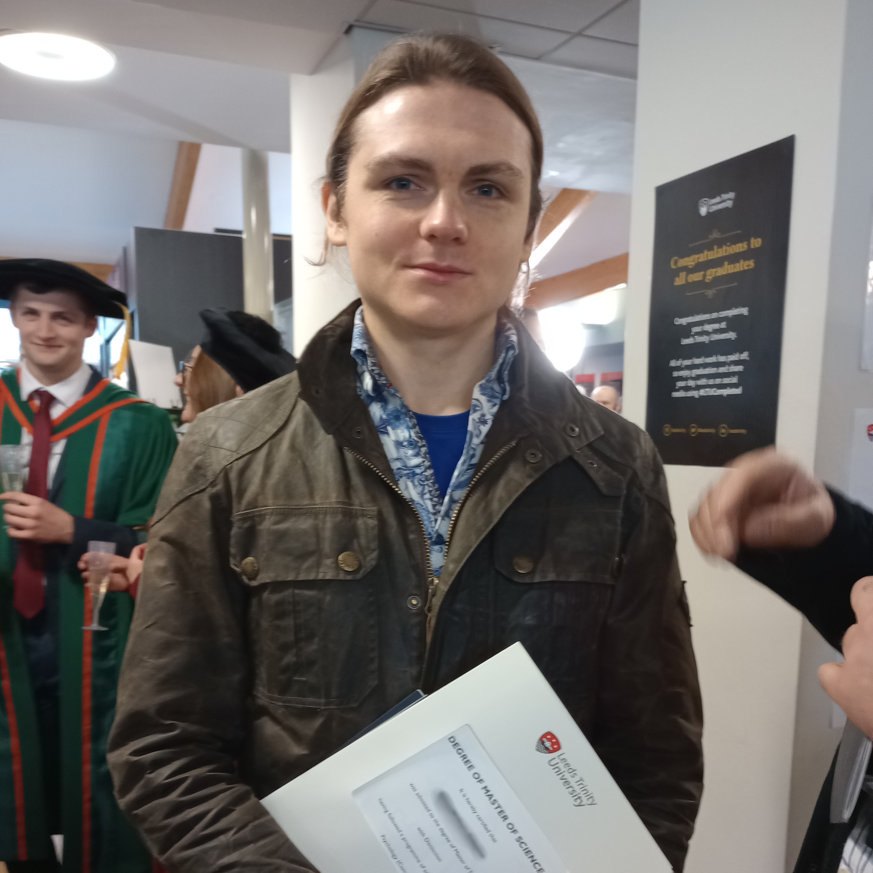 Ben graduating with a MSc in Psychology